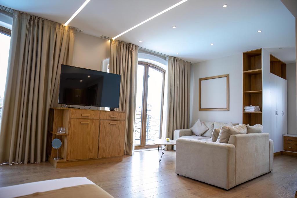 TV a/nebo společenská místnost v ubytování Vinea Resort
