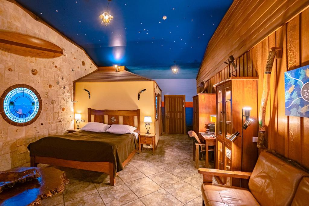 Postel nebo postele na pokoji v ubytování Hotel Rangá