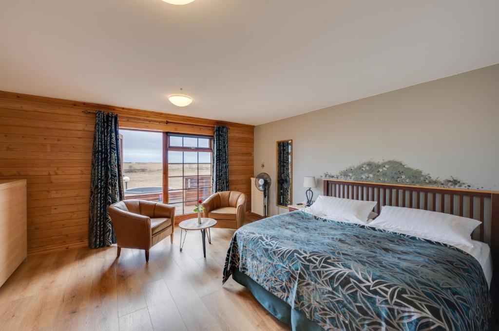Postel nebo postele na pokoji v ubytování Hotel Rangá