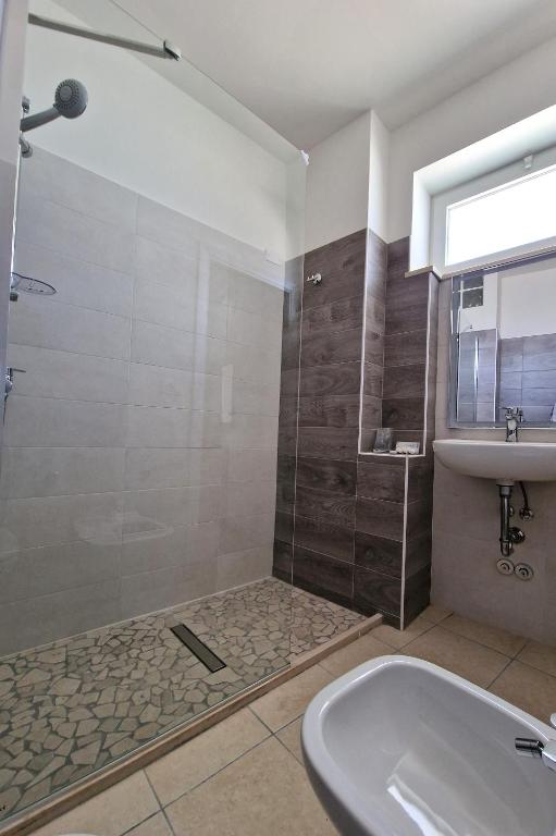 Koupelna v ubytování Hotel Rossella
