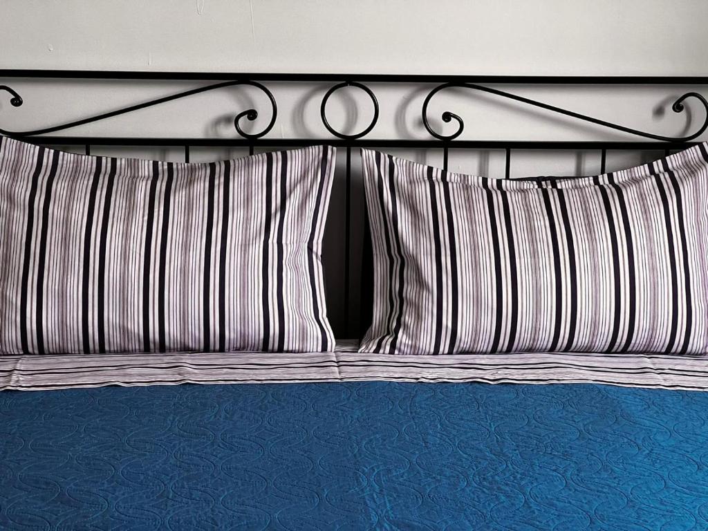 Postel nebo postele na pokoji v ubytování Camere Giulia