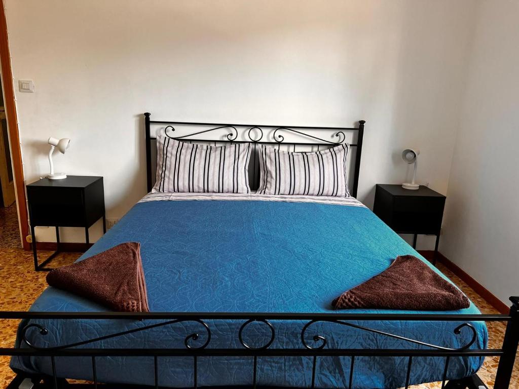 Postel nebo postele na pokoji v ubytování Camere Giulia