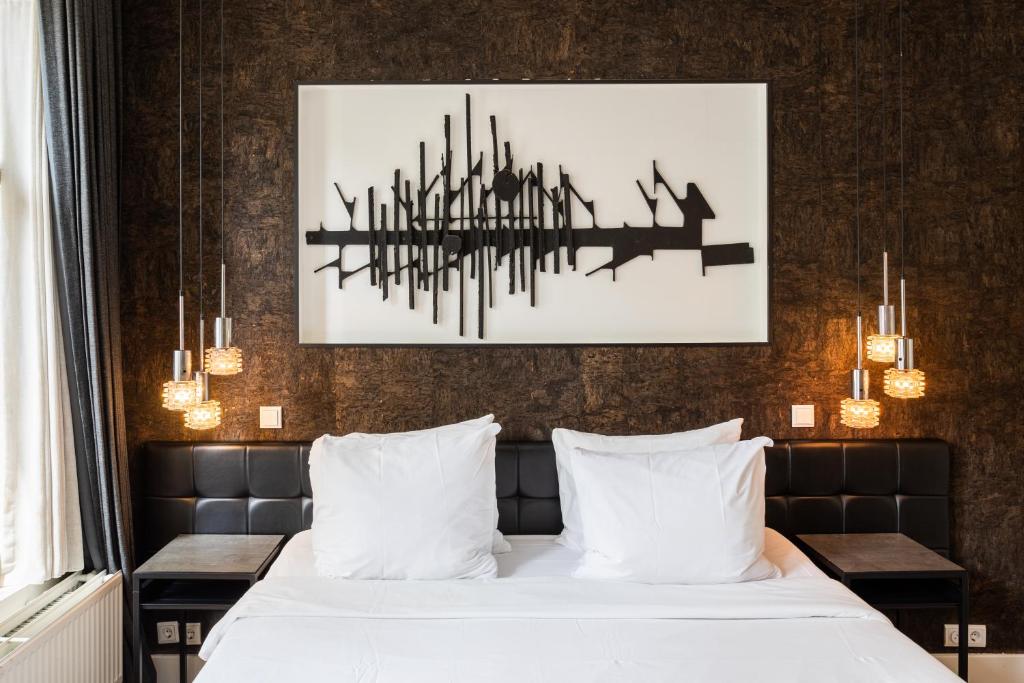 Postel nebo postele na pokoji v ubytování Weber Hotel 397