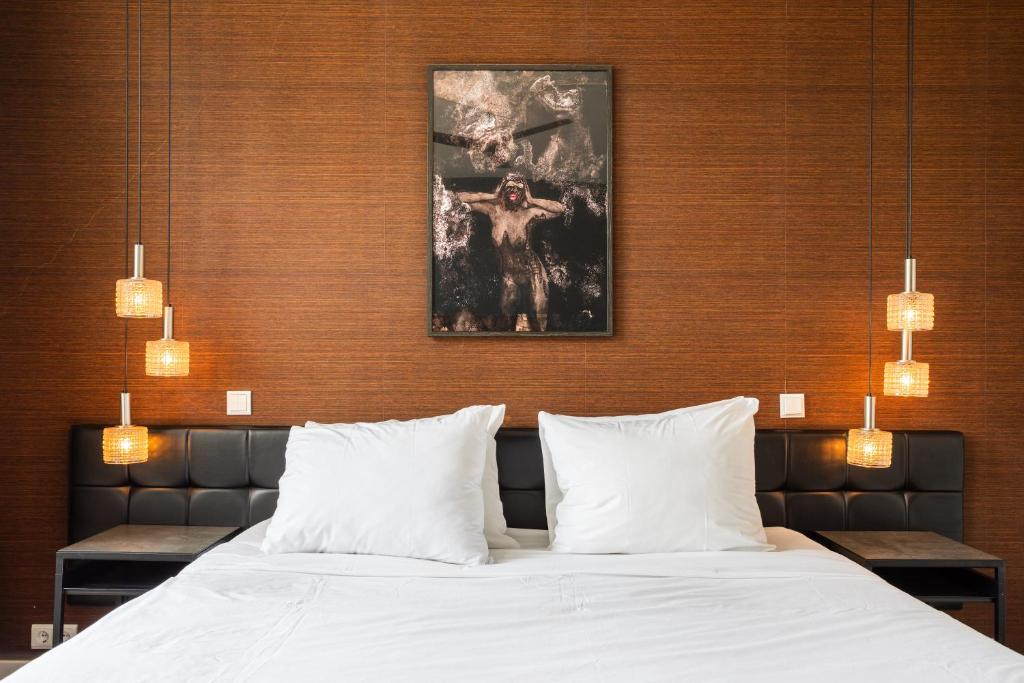 Postel nebo postele na pokoji v ubytování Weber Hotel 397