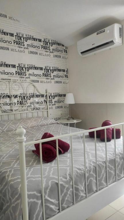 Posteľ alebo postele v izbe v ubytovaní Apartamentos centro histórico