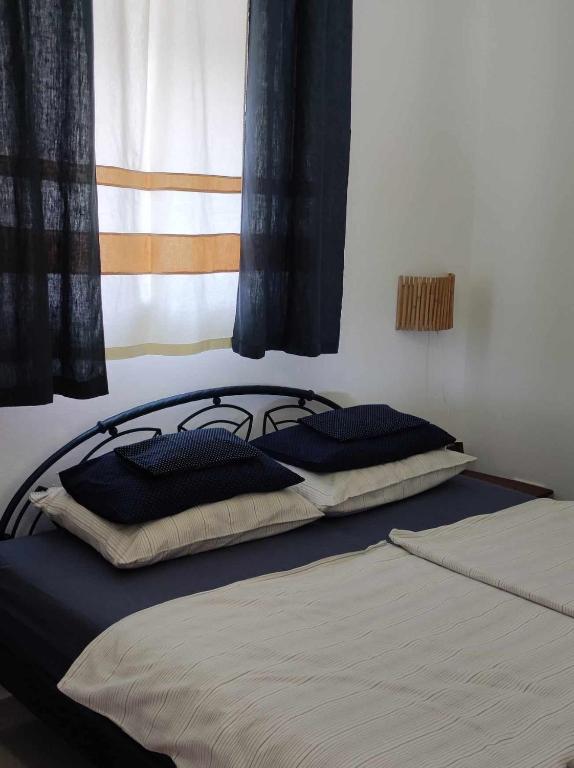 Łóżko lub łóżka w pokoju w obiekcie Villa Zen