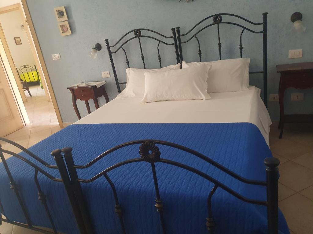 Postel nebo postele na pokoji v ubytování Azzurro mare
