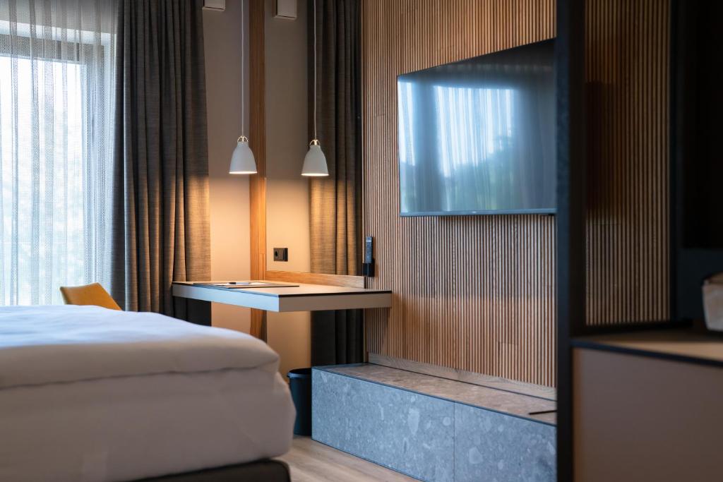Postel nebo postele na pokoji v ubytování Thöles Hotel Bücken