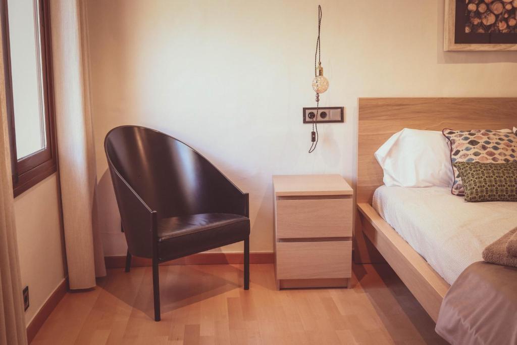 Postel nebo postele na pokoji v ubytování Ca la Tendeta