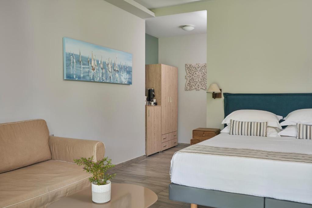 Łóżko lub łóżka w pokoju w obiekcie Mirabilia Boutique Hotel