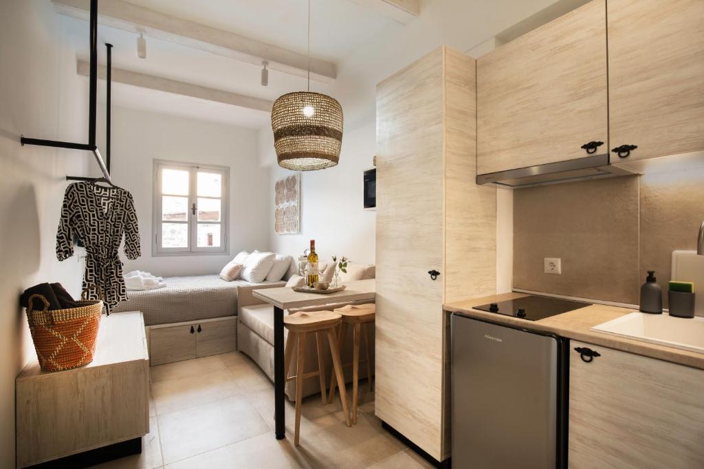 A kitchen or kitchenette at Thalassa Luxury Studios Lindos