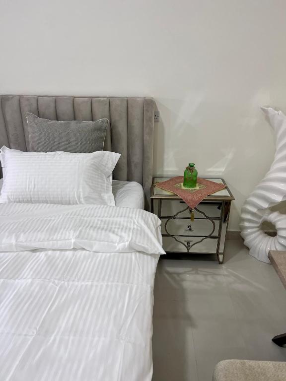 Postel nebo postele na pokoji v ubytování Al Artaa Resort