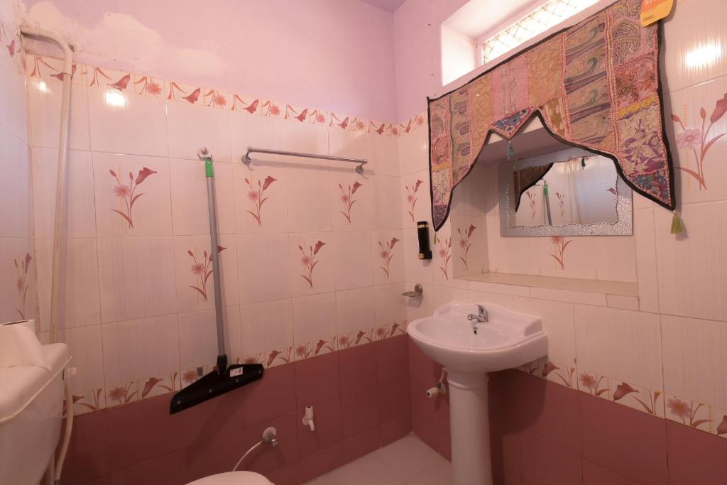 Koupelna v ubytování Hotel Renuka