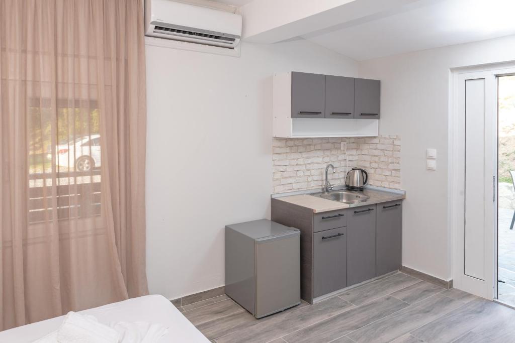 Kuchyňa alebo kuchynka v ubytovaní Medusa Rooms