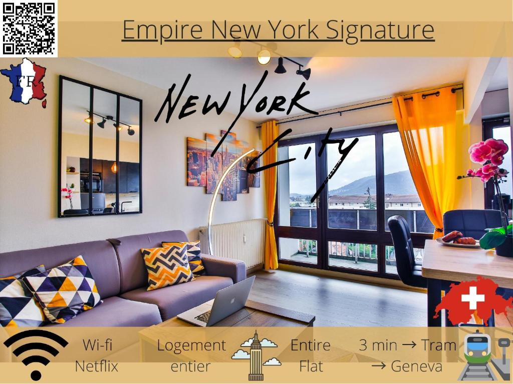 a living room with a couch and a large window at Empire New York Signature in Annemasse
