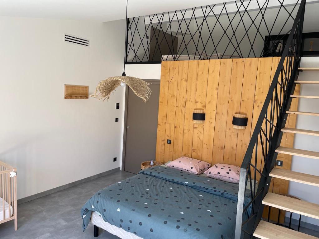 Postel nebo postele na pokoji v ubytování Le Corail