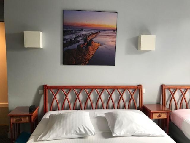 Postel nebo postele na pokoji v ubytování Hôtel Ohartzia