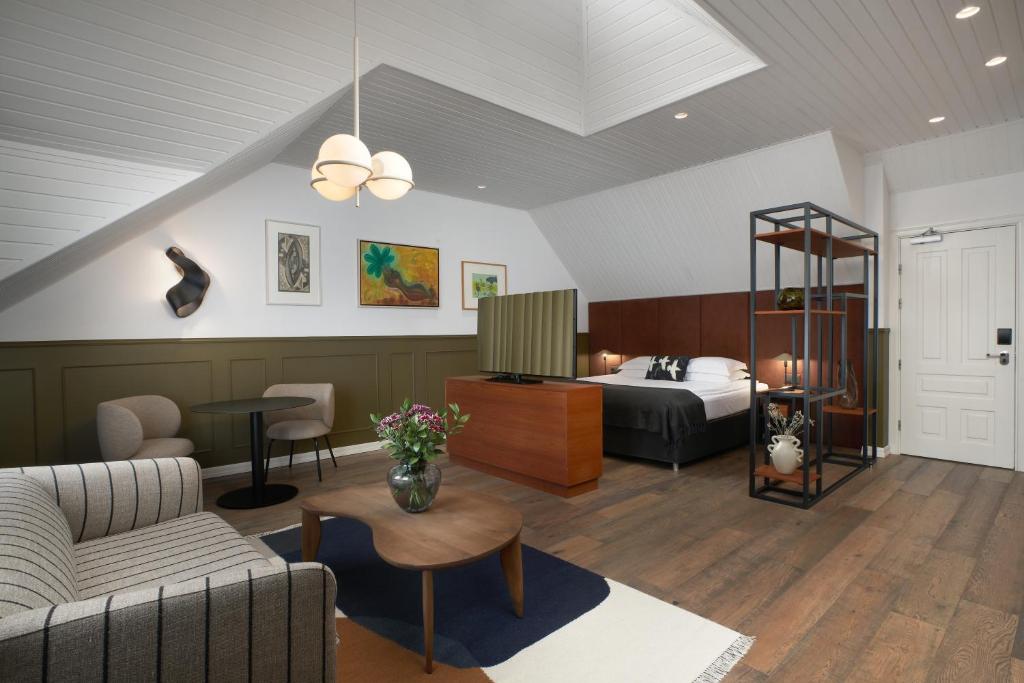 Postel nebo postele na pokoji v ubytování Alda Hotel Reykjavík