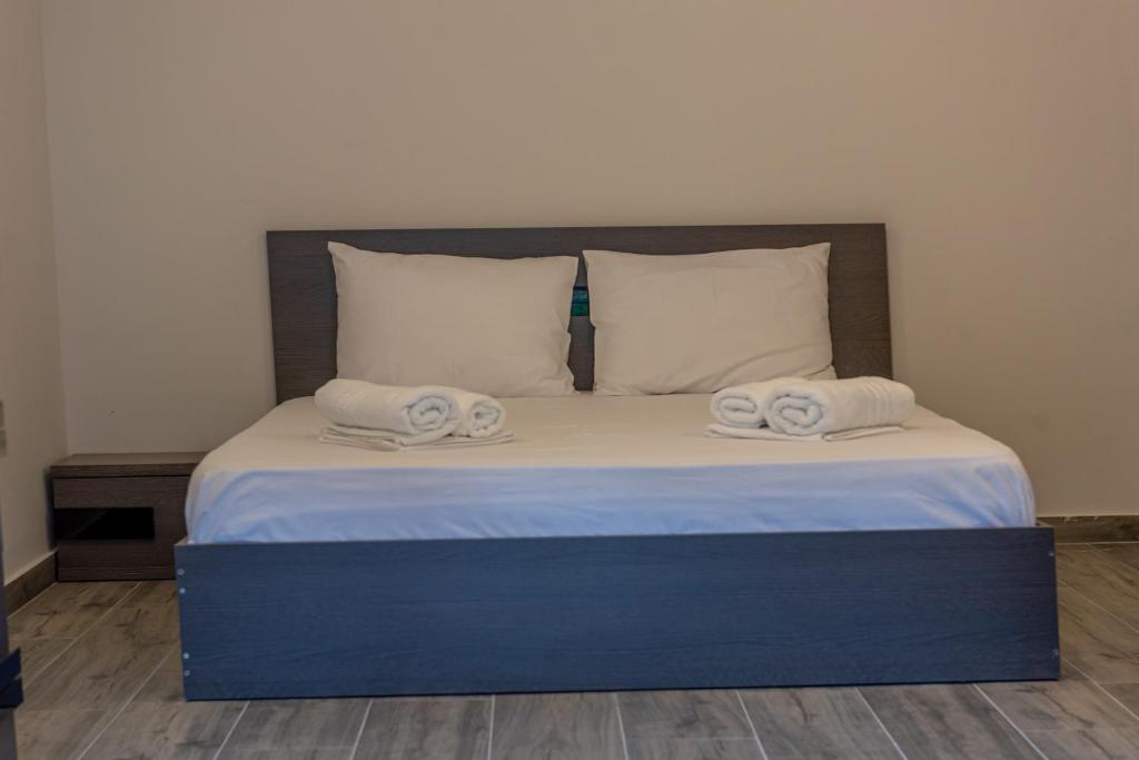 Posteľ alebo postele v izbe v ubytovaní Medusa Rooms