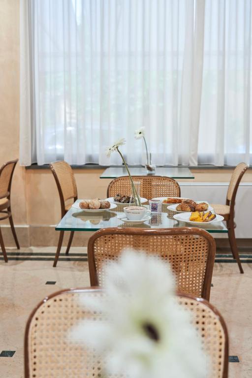 Posezení v ubytování Hotel Cyrano