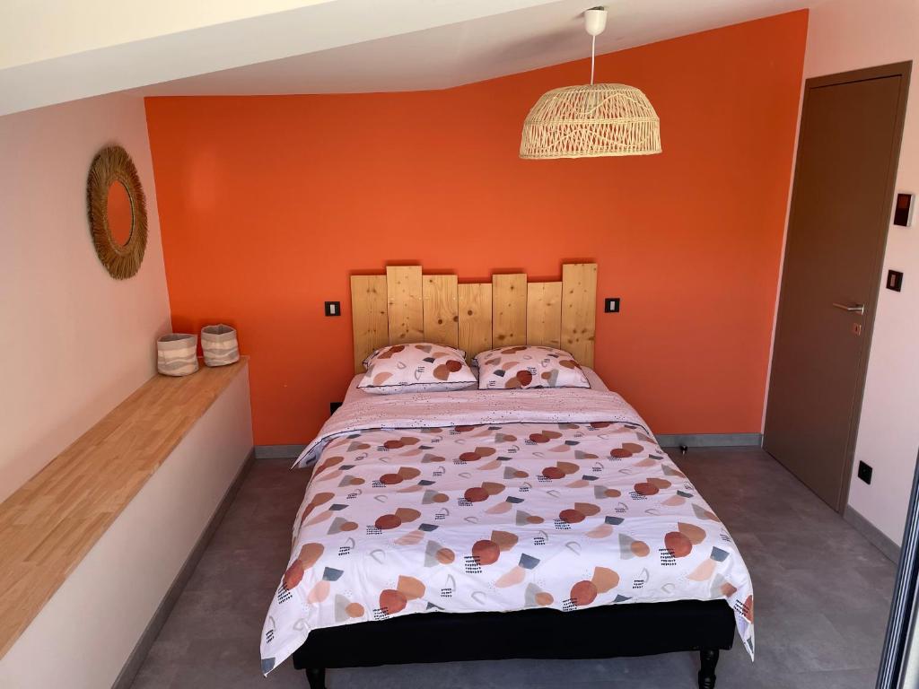 Postel nebo postele na pokoji v ubytování Le Corail