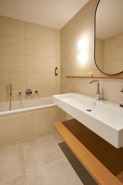 Koupelna v ubytování Dolcemente Garni Hotel Superior