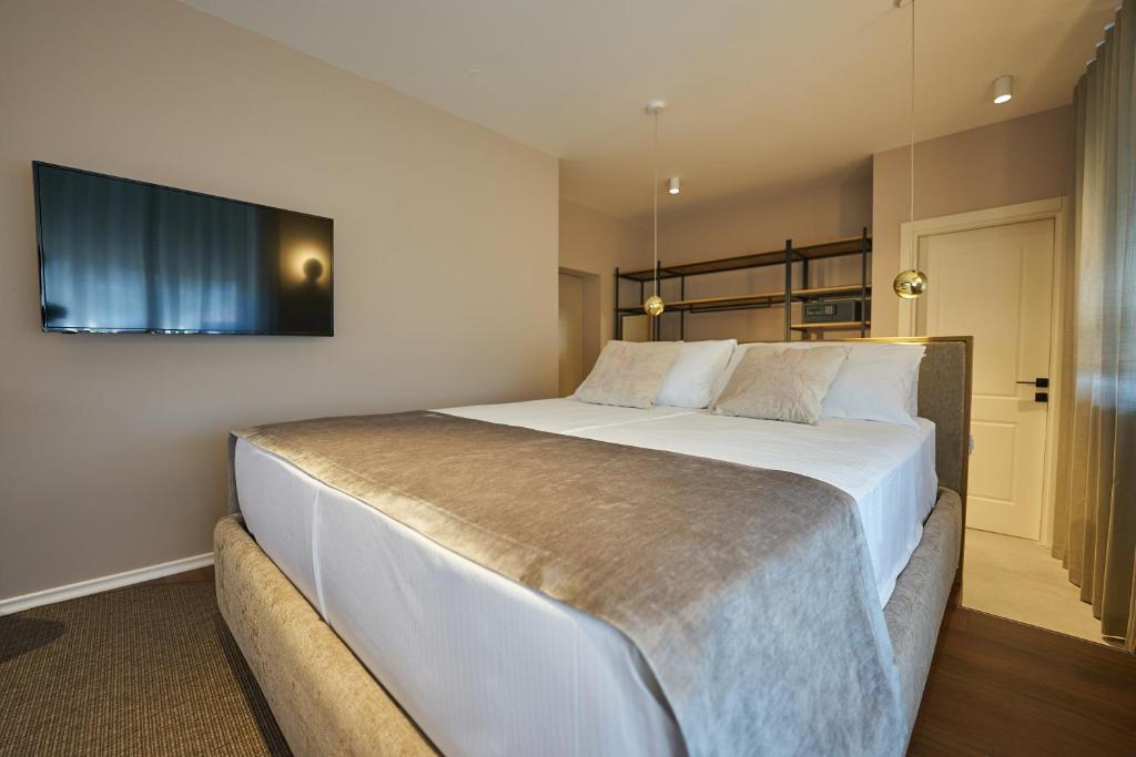 Postel nebo postele na pokoji v ubytování Dolcemente Garni Hotel Superior