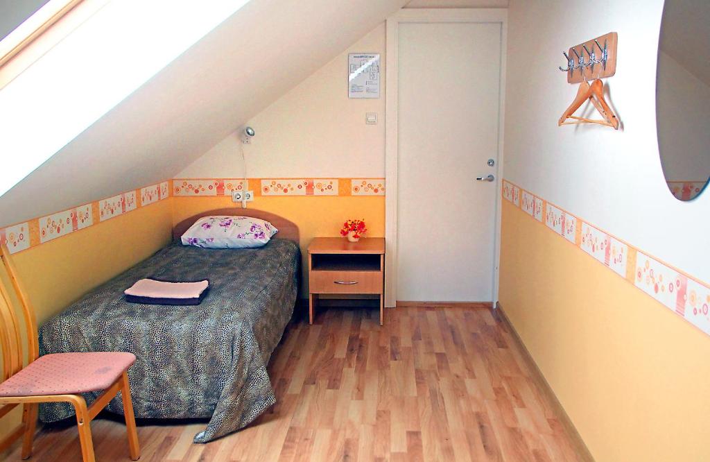 Postel nebo postele na pokoji v ubytování Rivaal Guesthouse-Cafe