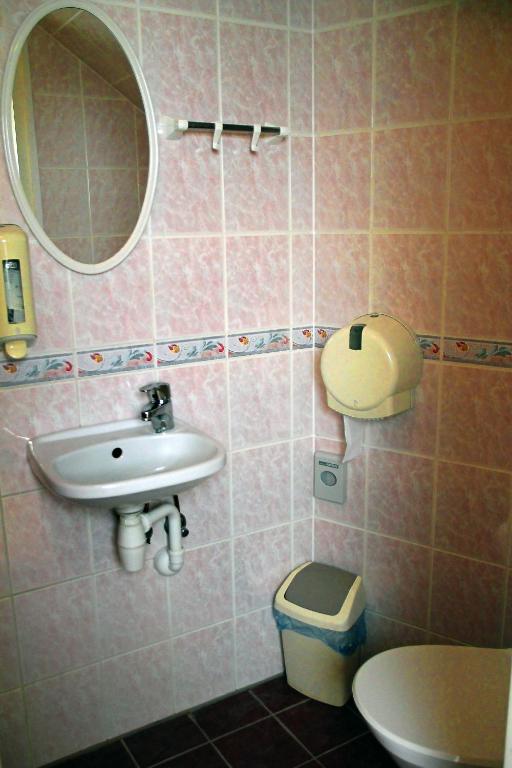 Koupelna v ubytování Rivaal Guesthouse-Cafe