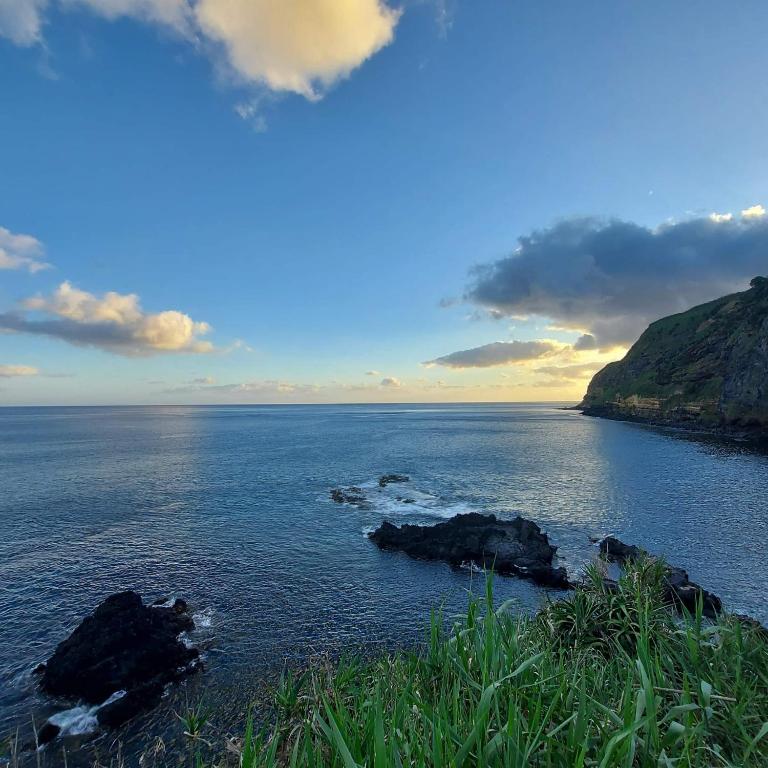a view of the ocean with rocks in the water at Pousada da Vila in Vila Franca do Campo