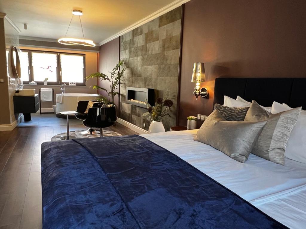 Postel nebo postele na pokoji v ubytování Margaréta Garden & SPA