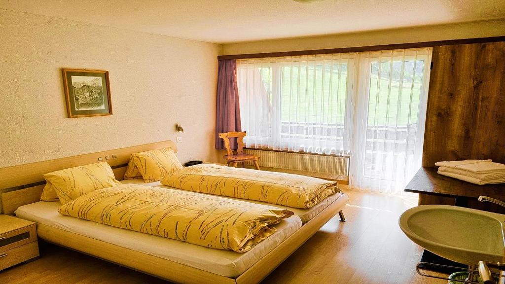 Postel nebo postele na pokoji v ubytování Apartments Atlas