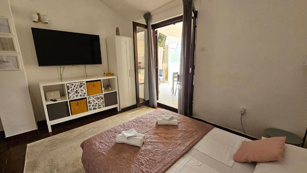 Postel nebo postele na pokoji v ubytování Apartman Hope
