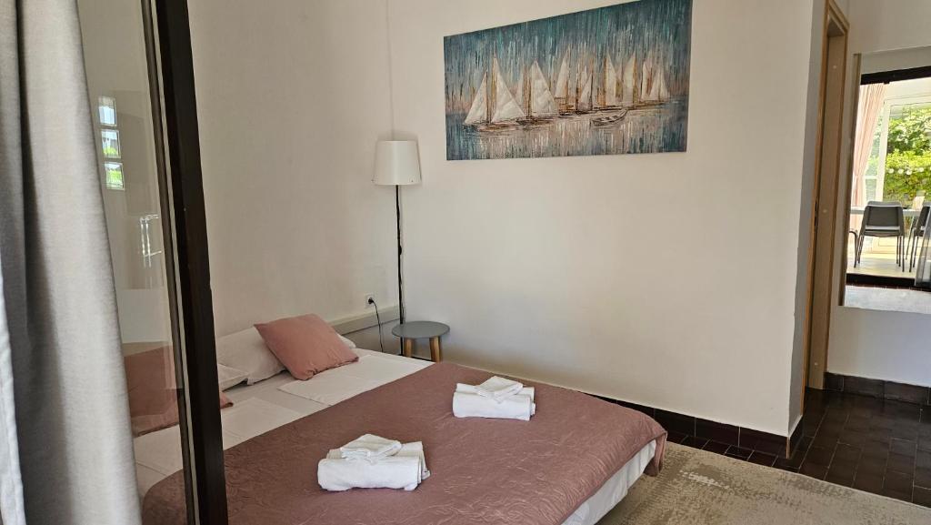 Postel nebo postele na pokoji v ubytování Apartman Hope