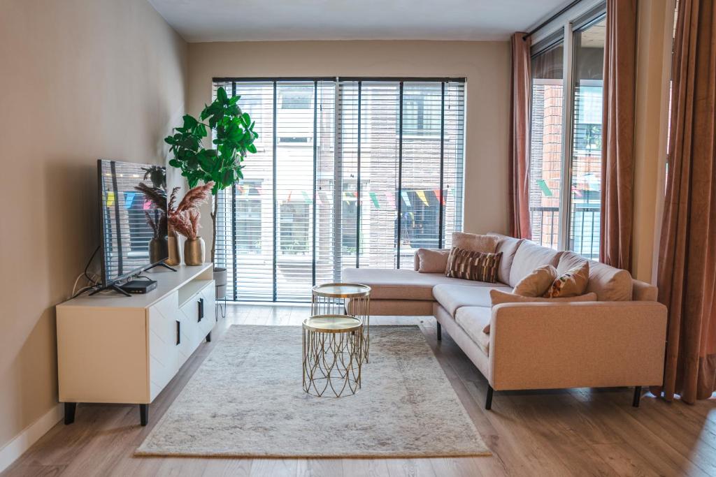 TV a/nebo společenská místnost v ubytování The Residence Enschede