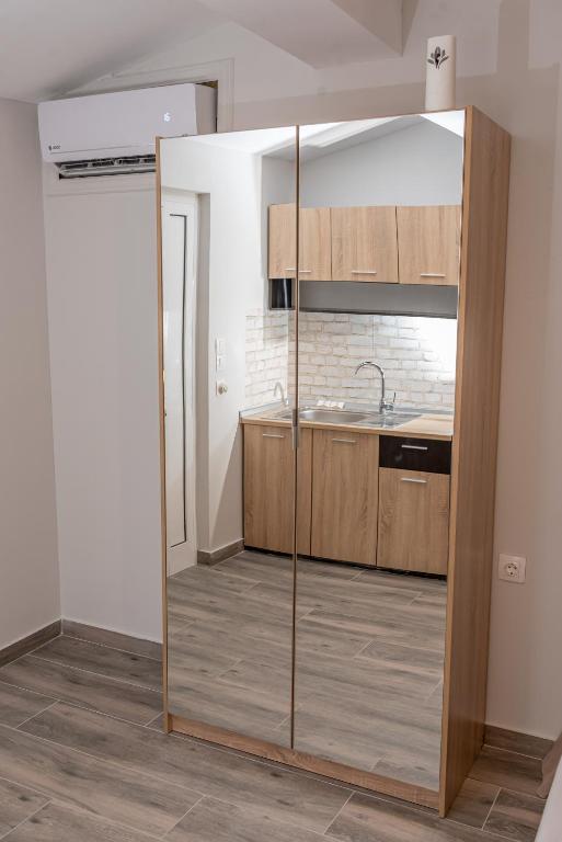 Kuchyňa alebo kuchynka v ubytovaní Medusa Rooms