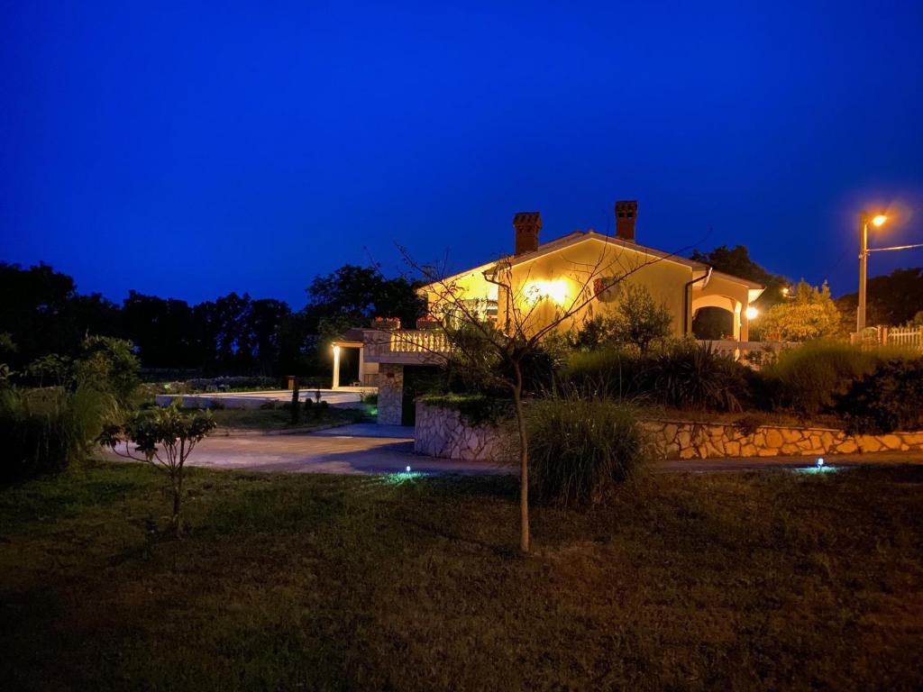 a building at night with lights on it at Villa Yucca Istra in Labin