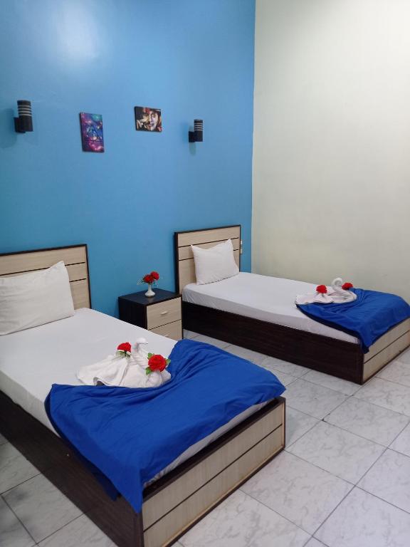 Postel nebo postele na pokoji v ubytování Hostgram Hotel