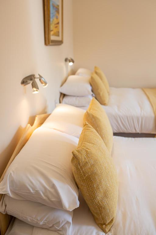Postel nebo postele na pokoji v ubytování Ceol na Mara Guest House