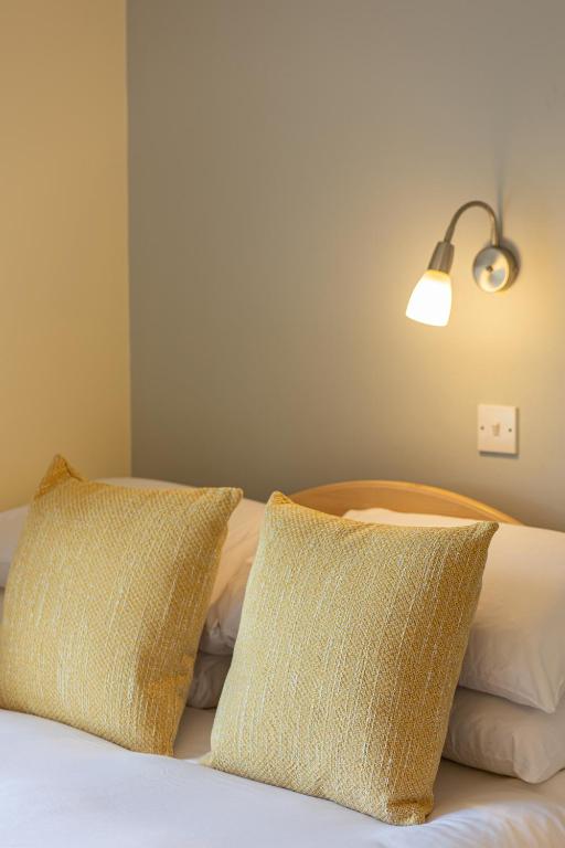 Postel nebo postele na pokoji v ubytování Ceol na Mara Guest House