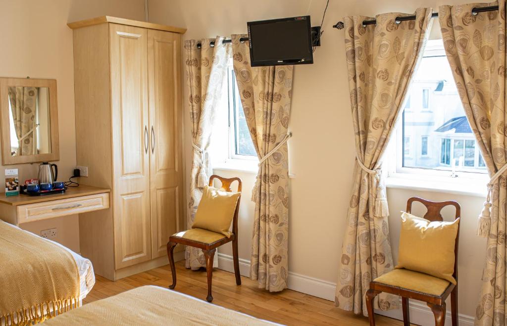 Postel nebo postele na pokoji v ubytování Ceol na Mara Guest House