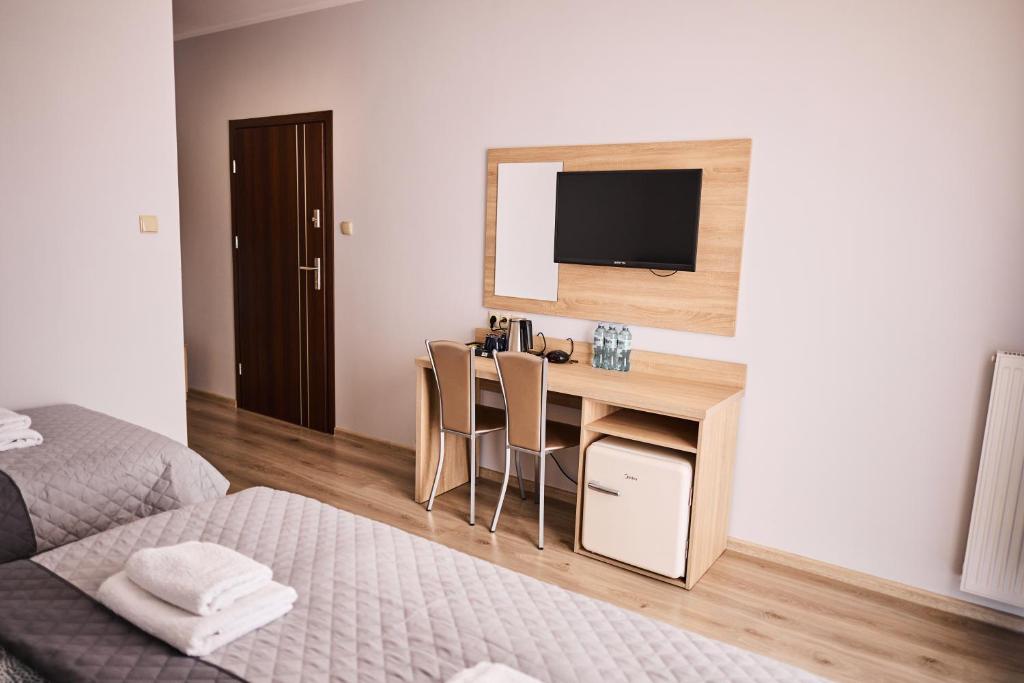 TV a/nebo společenská místnost v ubytování Villa Lima