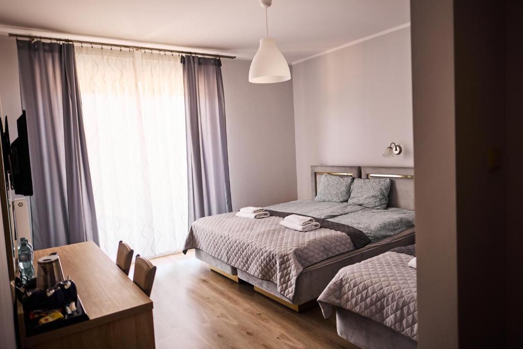 Postel nebo postele na pokoji v ubytování Villa Lima