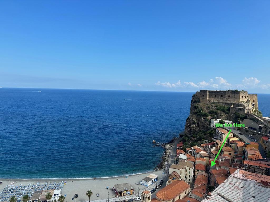 an aerial view of a city and the ocean at Casa Marina in Scilla