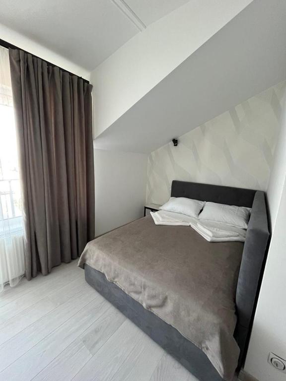 Postel nebo postele na pokoji v ubytování Forsage Hotel