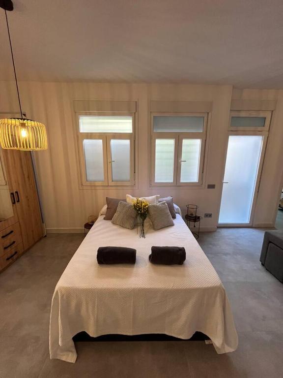 Posteľ alebo postele v izbe v ubytovaní Apartamento en Centro de Málaga