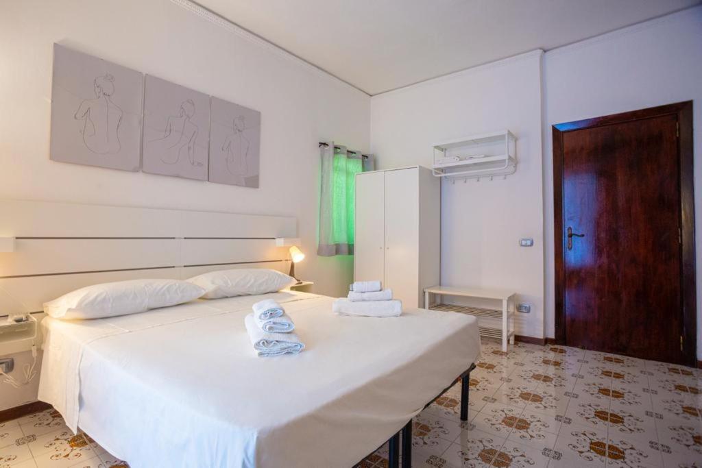 Posteľ alebo postele v izbe v ubytovaní Villa Rosa Rooms