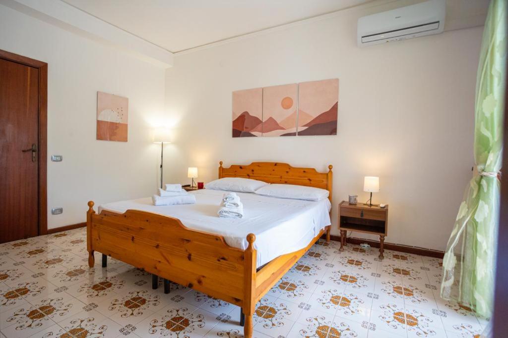 Postel nebo postele na pokoji v ubytování Villa Rosa