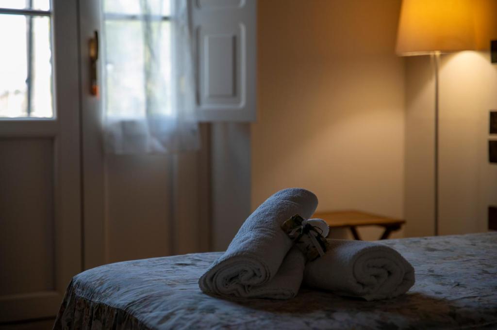Postel nebo postele na pokoji v ubytování Corte Volpe Home