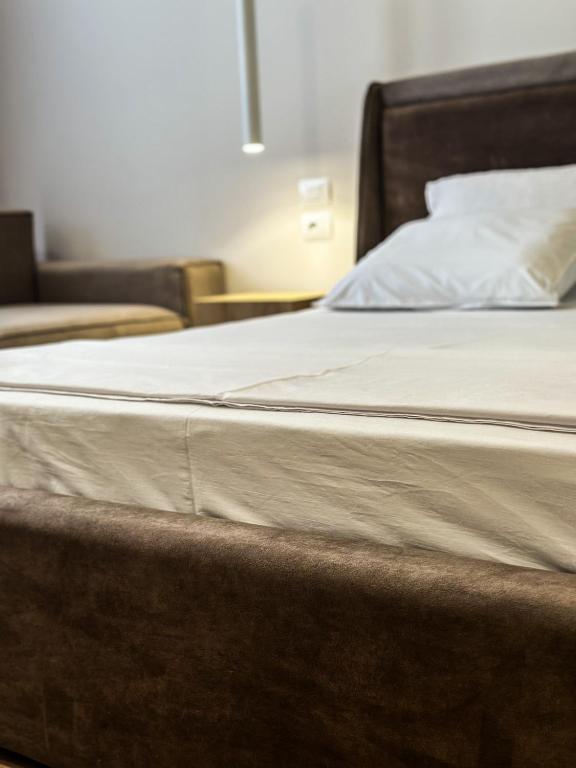 Postel nebo postele na pokoji v ubytování ALEXANDER Rooms